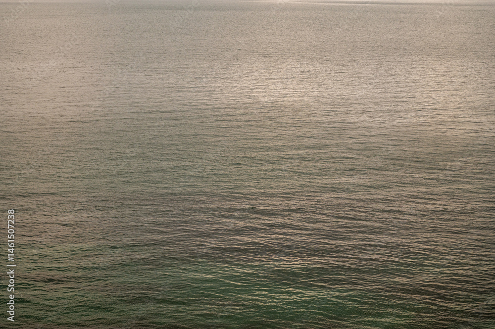 Water sea sunset. Sun reflection ocean waves. Nature abstract texture surface.