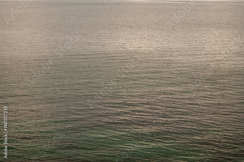 Water sea sunset. Sun reflection ocean waves. Nature  abstract texture surface.