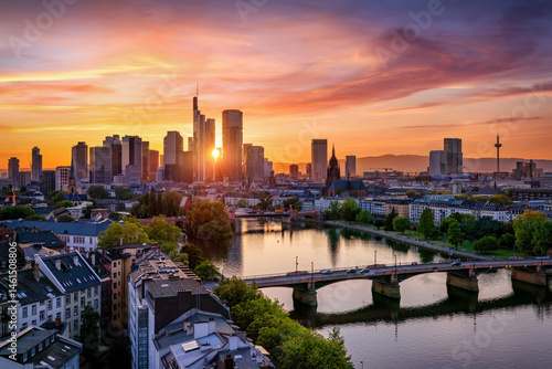 Obraz na płótnie Panoramic view of the city skyline of Frankfurt am Main, Germany, during a beautiful summer sunset with colorful sky w salonie