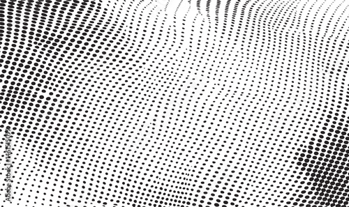 A dynamic abstract of closely spaced white dots against a dark background.