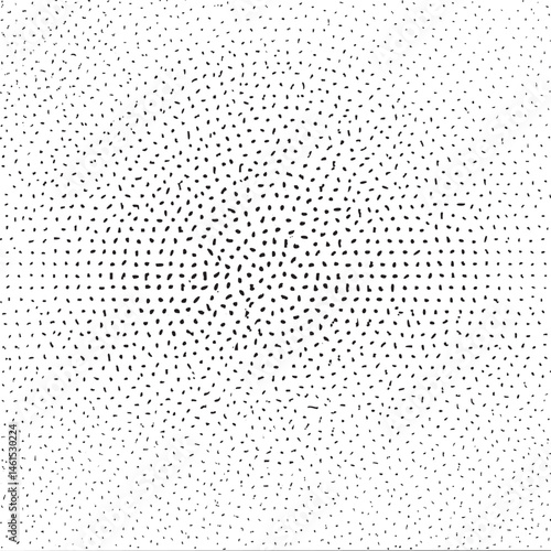 A dense collection of small dark dots covers the entire