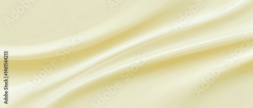 Obraz na płótnie Smooth and flowing fabric in a soft cream color, showcasing elegant texture and gentle curves. w salonie