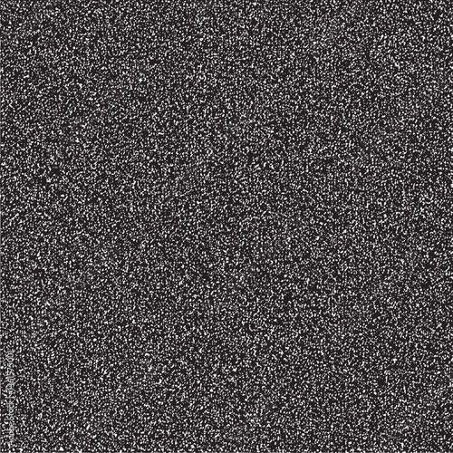 A dense field of tiny scattered white dots covers the entire frame.