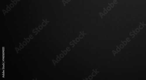 An expanse of stark shadowed charcoal textured and subtly graded