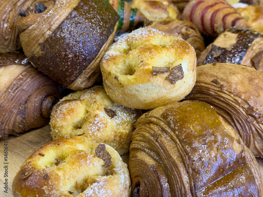 Delicious variety of croissants, pain au chocolat, and sweet rolls. Perfect for breakfast or a treat!