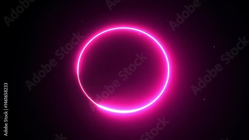 Glowing pink circle on black background