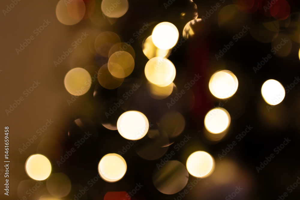 Abstract festive background with blurred golden lights. Perfect for Christmas, New Year, and winter holidays. Abstract festive background with blurred golden lights. Perfect for Christmas, New Year, and winter holidays.