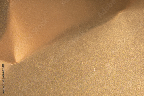 Obraz na płótnie High-resolution image of brushed gold metal texture. Perfect for backgrounds and design projects. w salonie