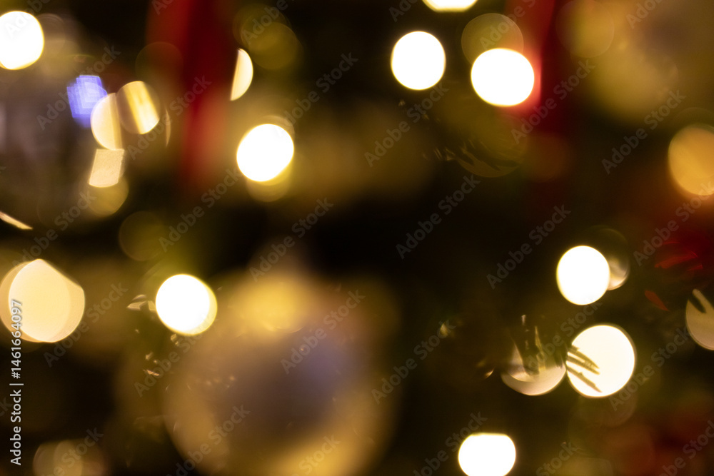 Beautiful bokeh background of warm golden Christmas lights, perfect for festive designs.