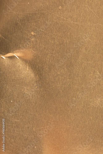 Obraz na płótnie High-resolution image of a scratched gold metal texture. Perfect for backgrounds and design projects. w salonie