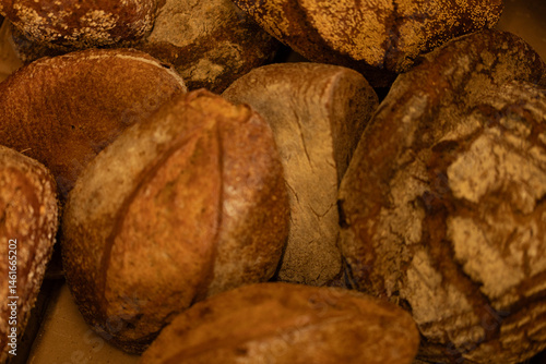 Obraz na płótnie Delicious rustic bread, freshly baked. Perfect for sandwiches or a snack. w salonie