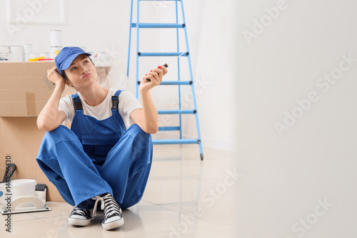 Thoughtful female decorator...