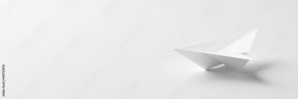 Fototapeta premium Minimalistic white paper airplane on white background with soft shadows, symbolic, travel