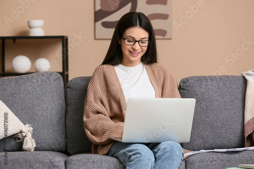 Beautiful young woman worki...
