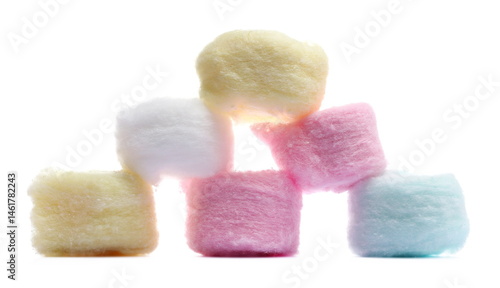 colorful cosmetic cotton balls isolated on white background, side view