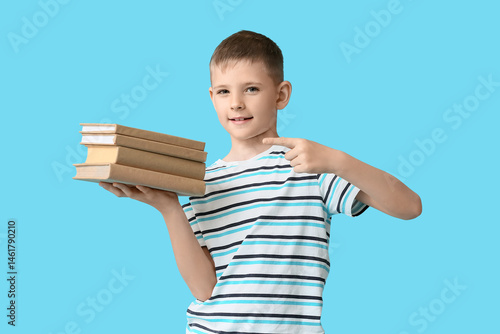 Cute little boy pointing on...