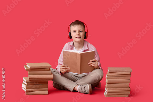 Cute little boy in headphon...