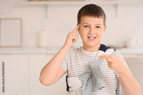 Mute boy using sign languag...