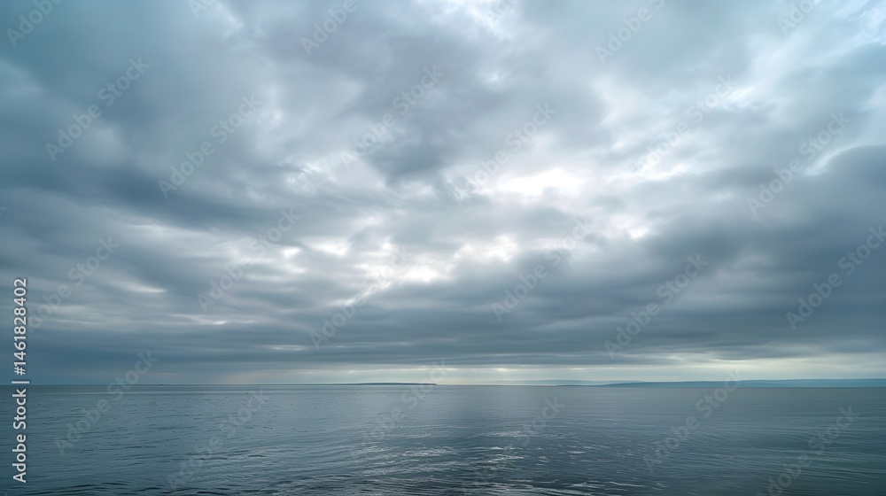Obraz premium Overcast Sky: A sky covered with thick, gray clouds, setting a mood of calm and introspection. 