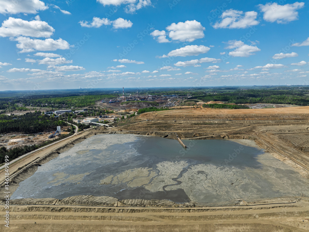 Industrial coal mine, abstract sendimentation tank of mine in Poland. Industrial lake Aerial drone photo view. Settling tanks and clarifiers are on wastewater treatment plant