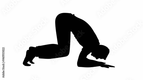  Black silhouette of a person forearms and head resting on the ground, hips raised, silhoutee of praying man