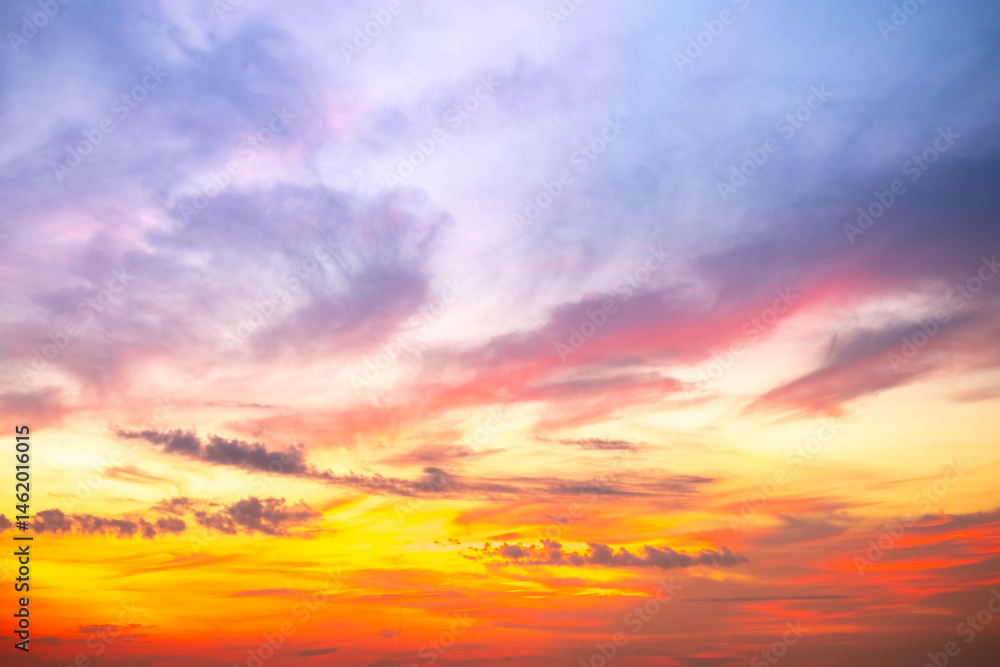 Obraz premium Beautiful , luxury soft gradient orange gold clouds and sunlight on the blue sky perfect for the background, take in evening,Twilight, Large size, high definition landscape photo