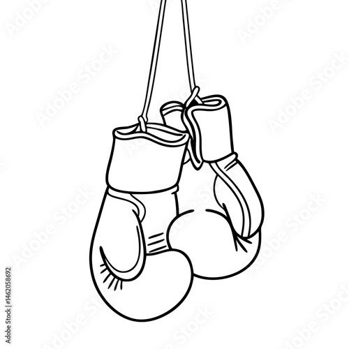 Boxing gloves hanging against a minimalist background  
