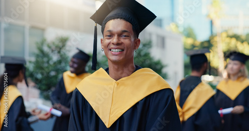 Happy, man and portrait of graduate in city for education goal, qualification or achievement. Smile, outdoor and male university student with pride for college degree with learning at campus in town.