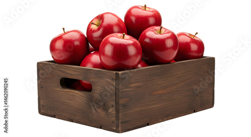 A wooden crate overflowing with shiny red apples.  A harvest bounty!