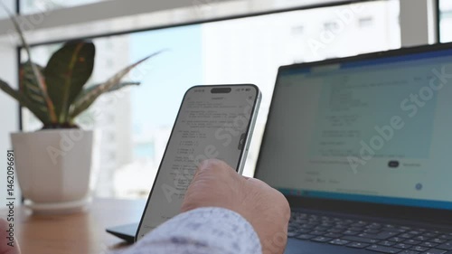  Adult male using OPEN AI ChatGPT on a smartphone. Artificial intelligence technology. Smartphone closeup. Male hands using AI on phone. High quality 4k footage. 