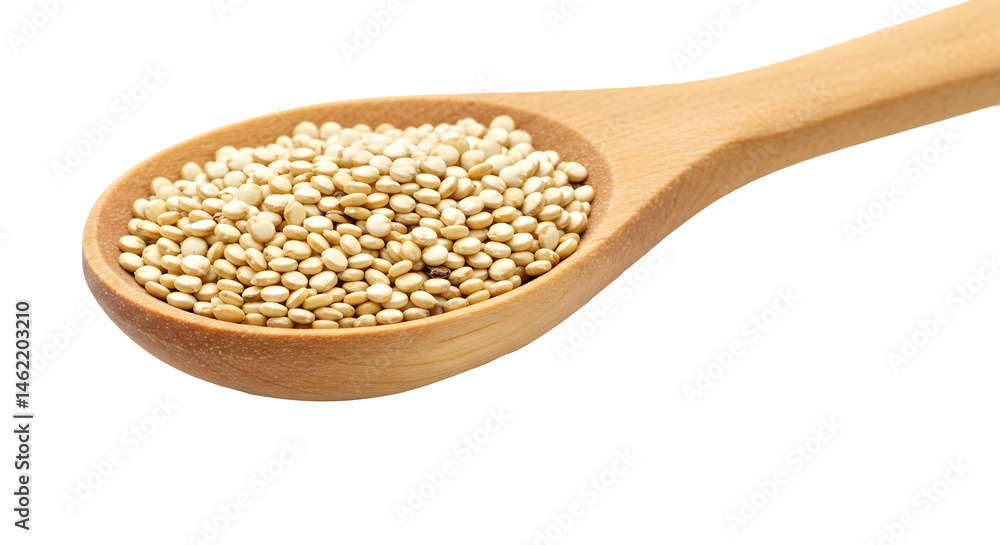 A wooden spoon filled with uncooked quinoa.