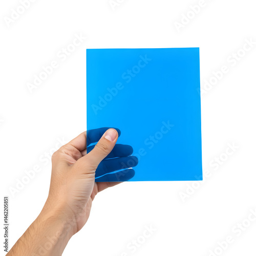 Obraz na płótnie A hand holds a vibrant blue card. Simple, bold, and ready for your message! w salonie