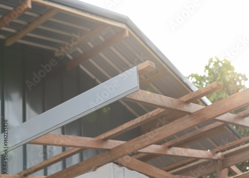 Photography Gray eaves installation at end of rafter