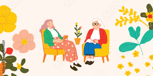 Two women sit comfortably in vibrant armchairs amidst a charming floral setting, engaged in an intimate conversation, a moment of connection and shared experience.