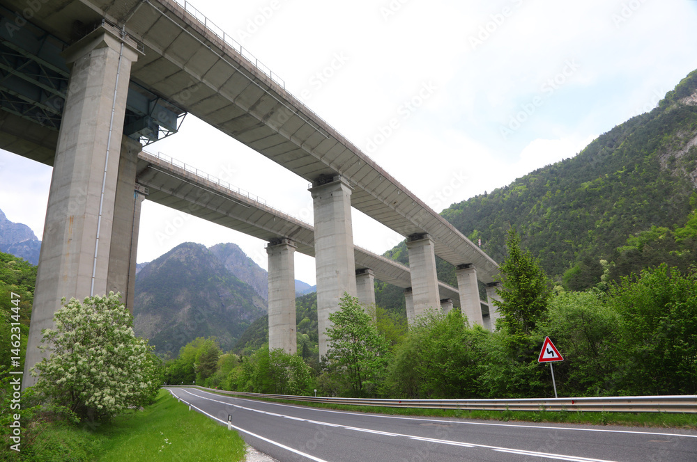 immense viaduct with pylons in reinforced concrete seen from below