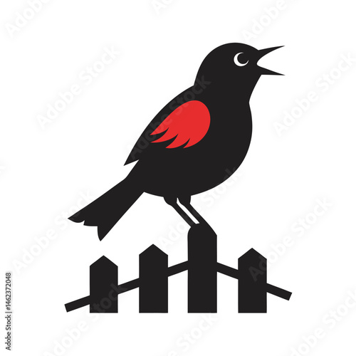 Red Winged Blackbird Singing On Fence Post