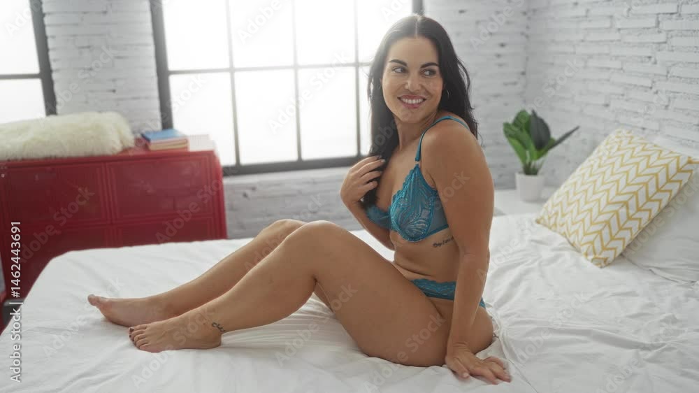 custom made wallpaper toronto digitalSmiling woman in lingerie sitting on bed in stylish bedroom
