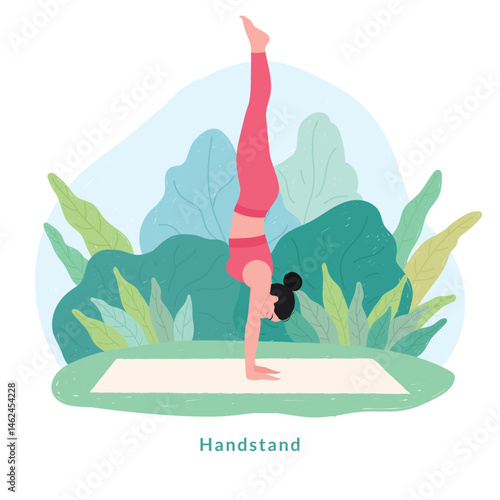 Hand stand pose. Young woman practicing Yoga pose. Woman workout fitness, aerobic and exercise