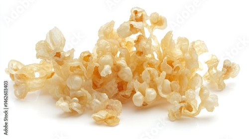 Crispy sushi rolls with tempura bits and spicy mayo drizzle on white