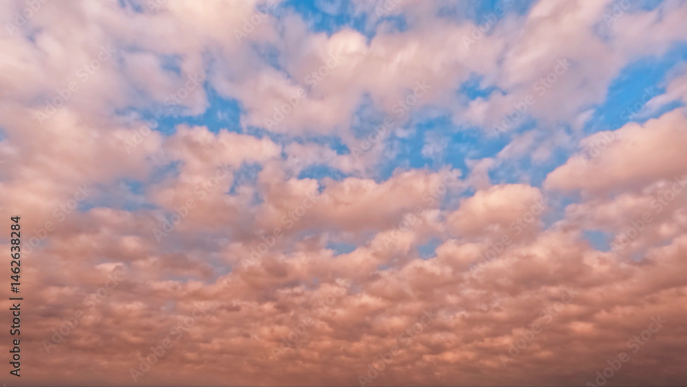 Fototapeta premium beautiful sundown gold clouds on the sky background - photo of nature