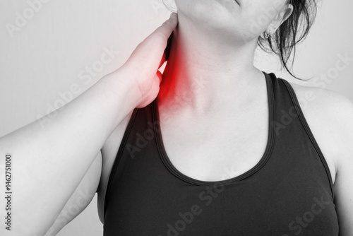 woman with neck pain. Close-up. Shoulder, neck pain.
