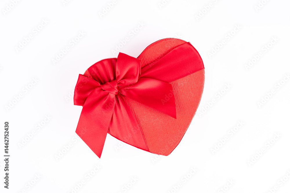 Red and heart shaped chocolate or candy box on white background