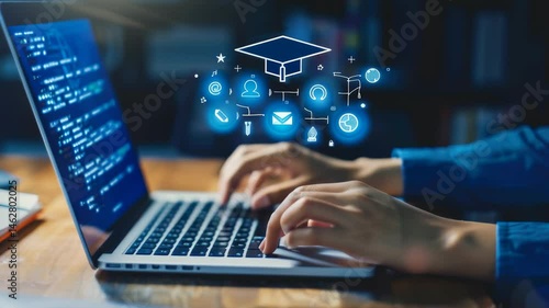Wallpaper Mural A person is typing on a laptop. A graduation cap and several education icons hover above the keyboard, suggesting digital learning, technology, and the future of education and skills. Torontodigital.ca