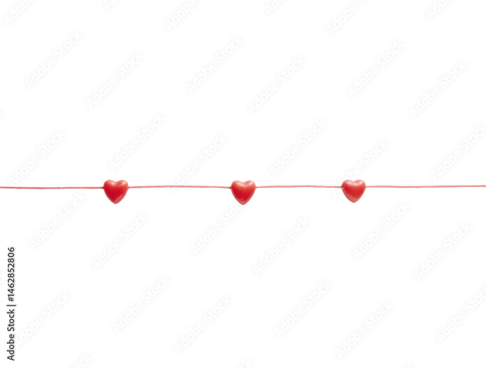 A Minimal Red String Stretched Horizontally Across the Middle of the Frame with Three Small Hearts A Minimal Red String Stretched Horizontally Across the Middle of the Frame with Three Small Hearts