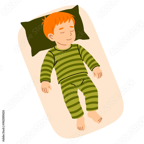 Young boy sleeping flat on his back in striped green pajamas with head on pillow