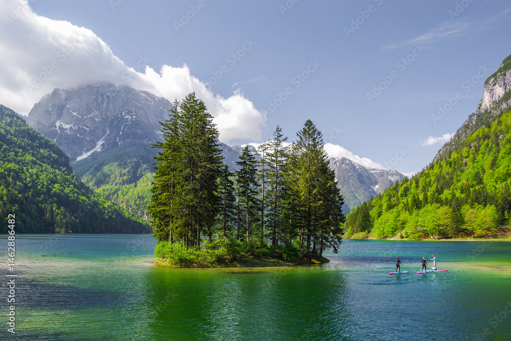 Predil Lake in the Julian Alps, Tarvisio with mountains in background, Italy, Europe