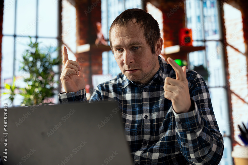 Teleworker in home office using laptop, preparing presentation slides, adjusting layouts. Freelancer finishing company project, writing summaries, saving files on notebook, uploading materials