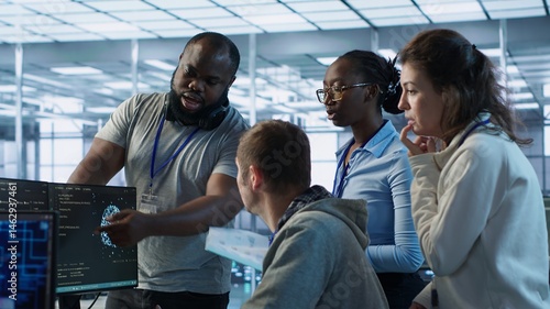 Technician doing brainstorming with colleagues to fix error in code affecting server room AI workloads. Team of artificial intelligence engineers repairing data center systems together, camera A