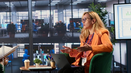 Obraz na płótnie Female business leader in a professional office strategizing for development success, discussing with the main investor. Self accomplished women driving innovation and gender equality. Camera A. w salonie