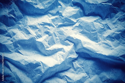 Wallpaper Mural Textured crumpled light-blue paper.  A close-up view of deeply wrinkled, light-blue paper, with various shades and folds Torontodigital.ca
